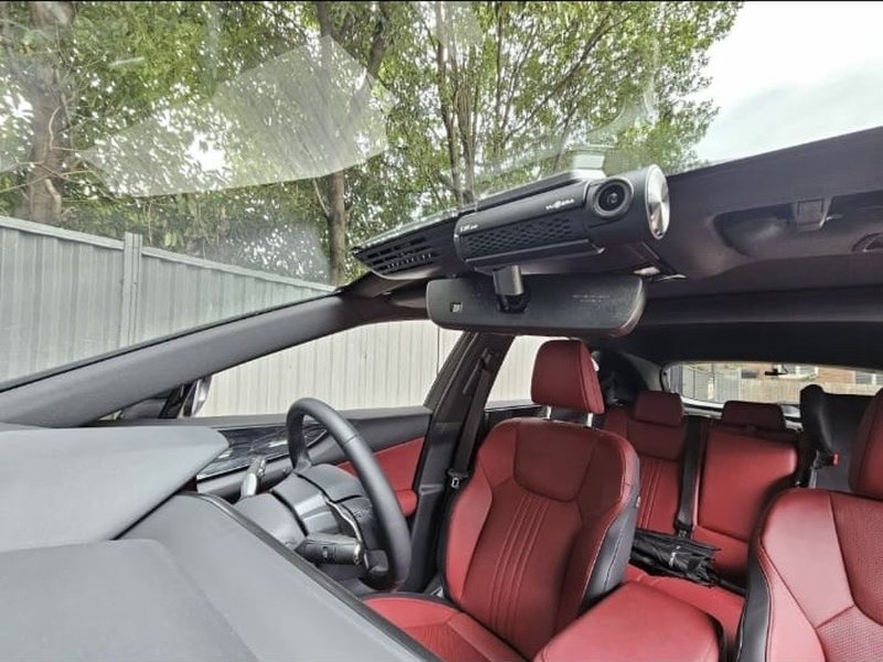 Dash cam mounted on a windscreen
